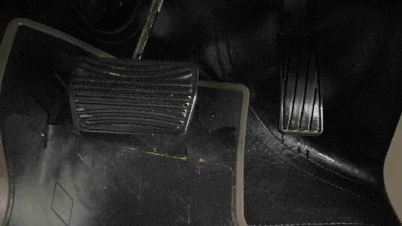 Close-up of the foot pedals in a Mahindra XUV 3XO