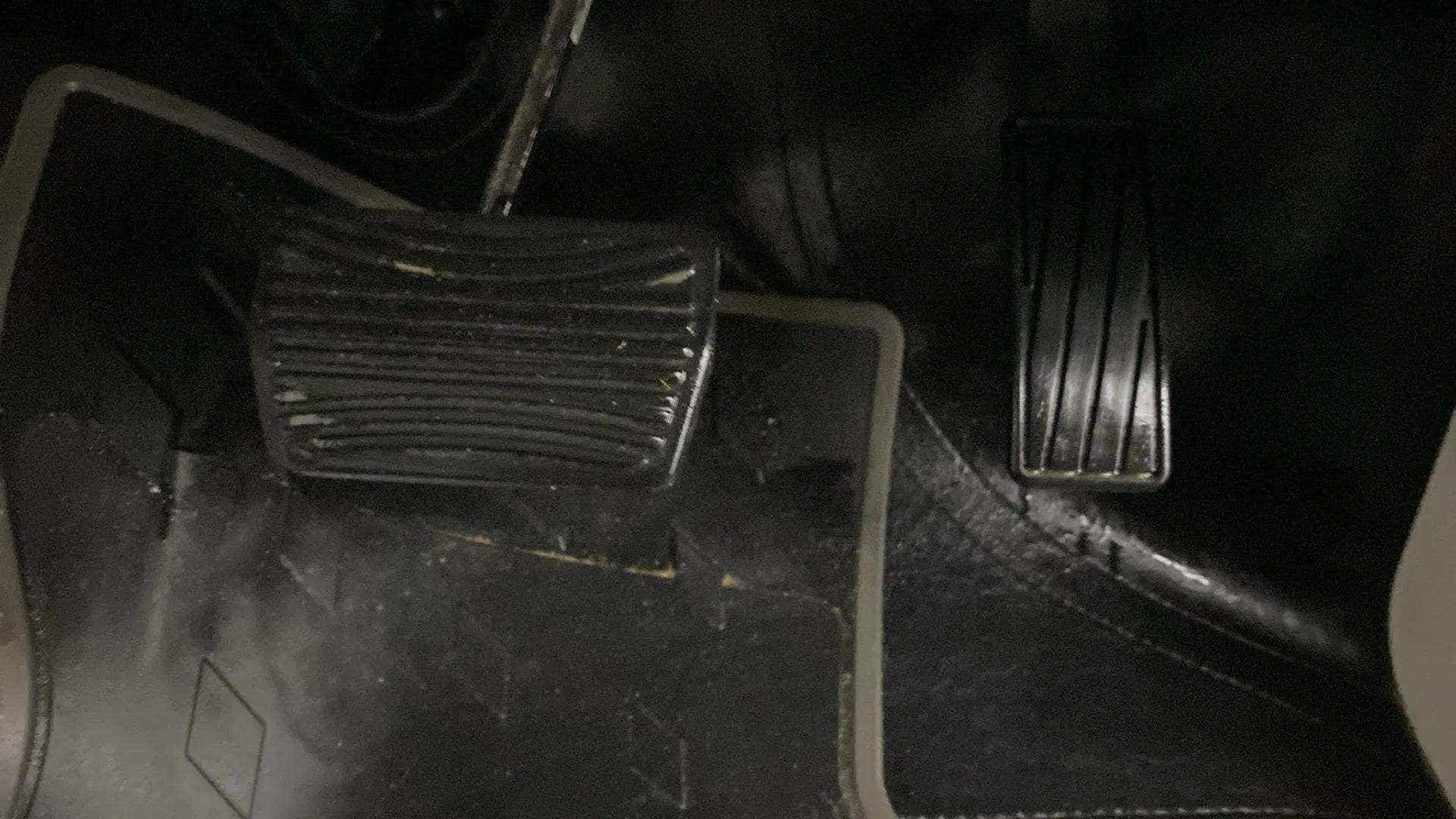 Close-up of the foot pedals in a Mahindra XUV 3XO