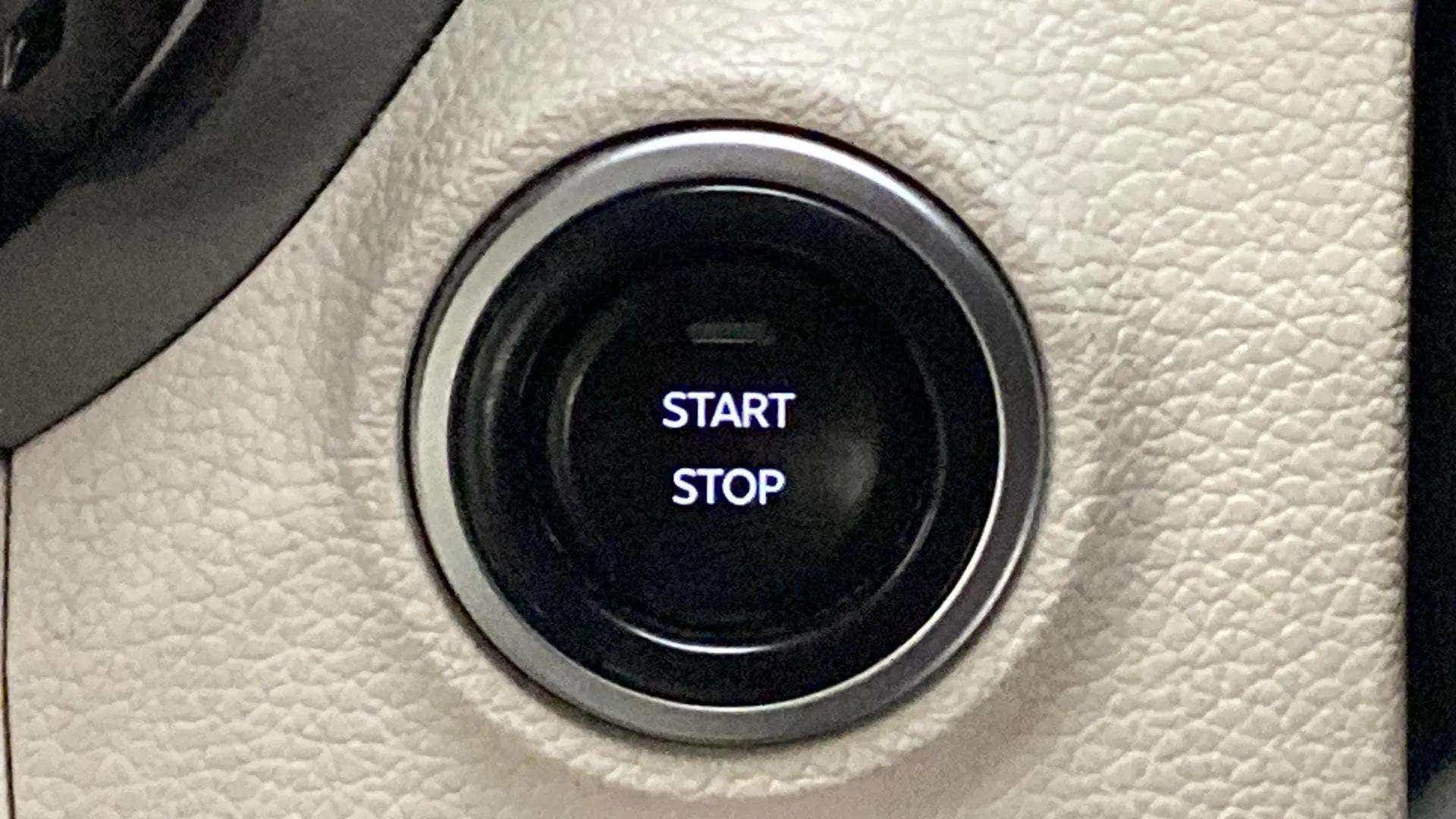 Close-up of the start stop button of a Mahindra XUV 3XO