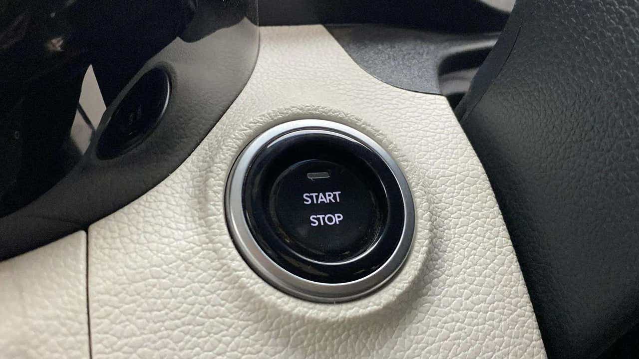 Close-up of the start stop button of a Mahindra XUV 3XO