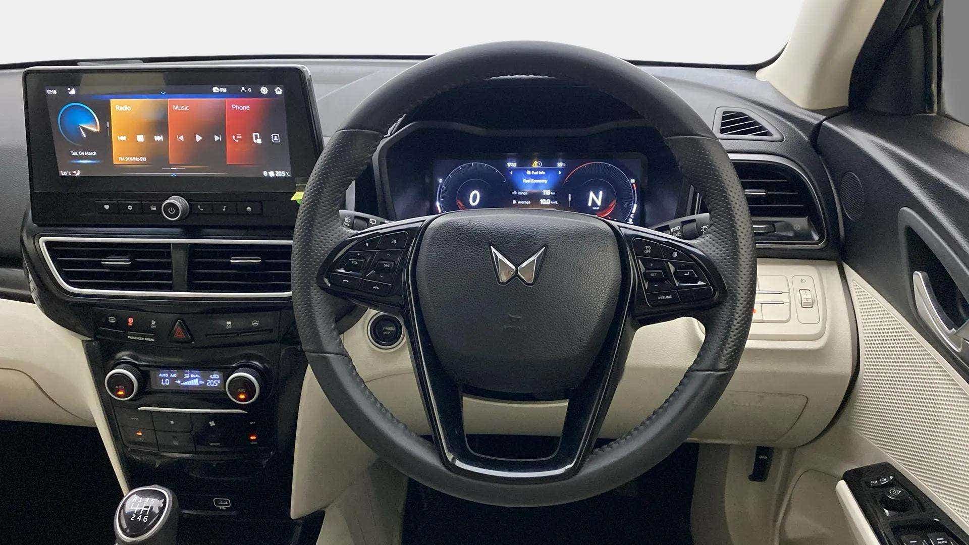 Interior dashboard and steering wheel of a Mahindra XUV 3XO