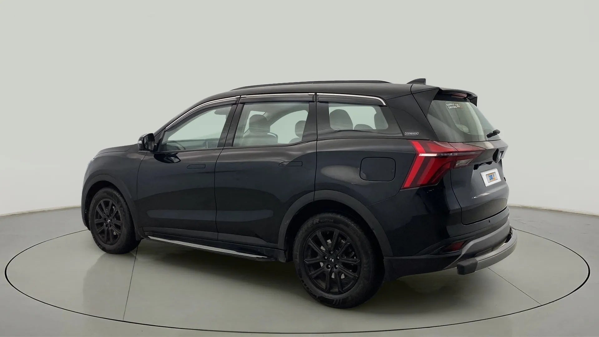 Rear three-quarter of a Mahindra XUV700