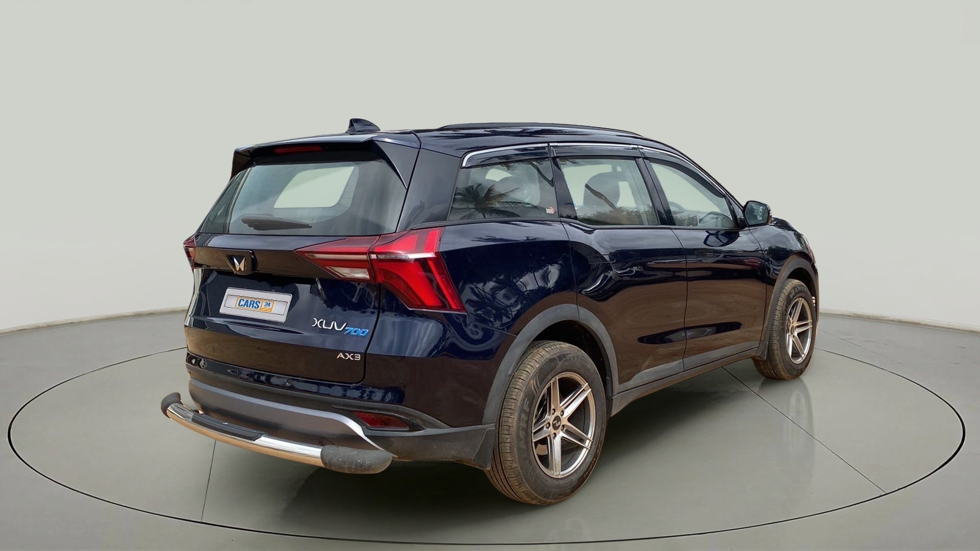 Rear three-quarter view of a Mahindra XUV700 AX3