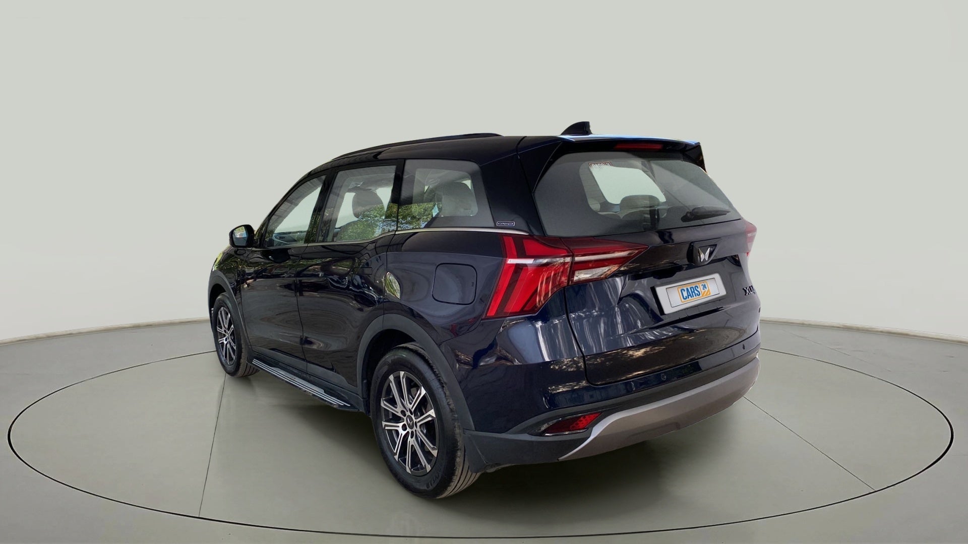 Rear three-quarter of a Mahindra XUV700