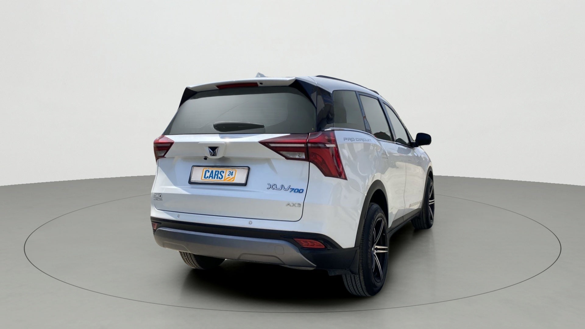 Rear three-quarter view of a Mahindra XUV700 AX3