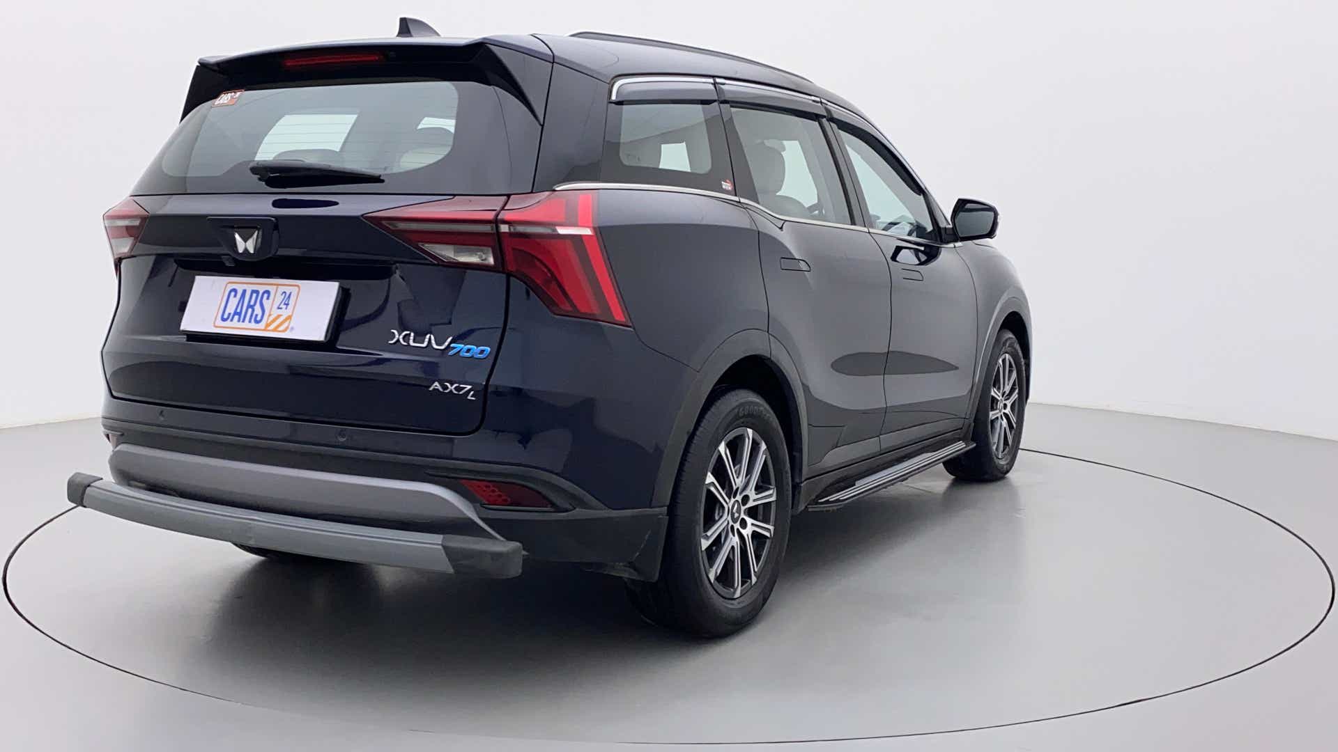 Rear three-quarter of a Mahindra XUV700 AX7L