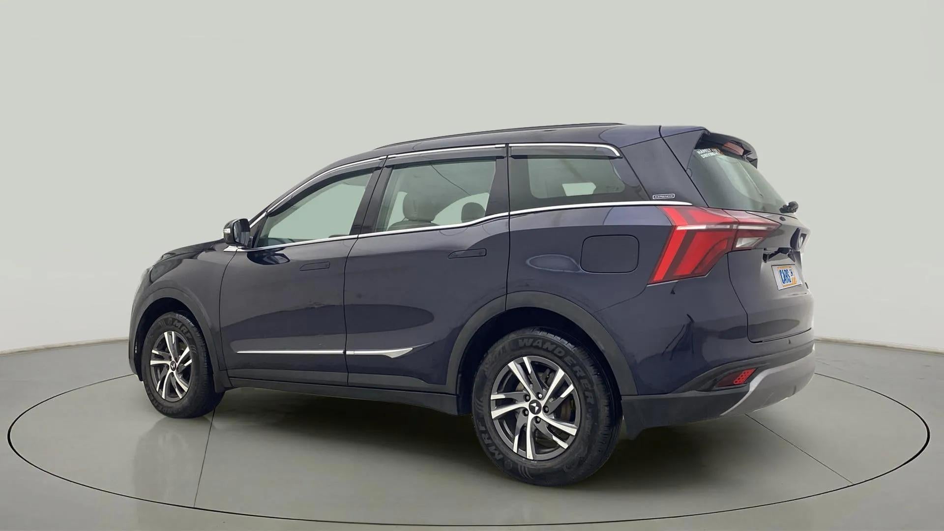 Rear three-quarter of a Mahindra XUV700