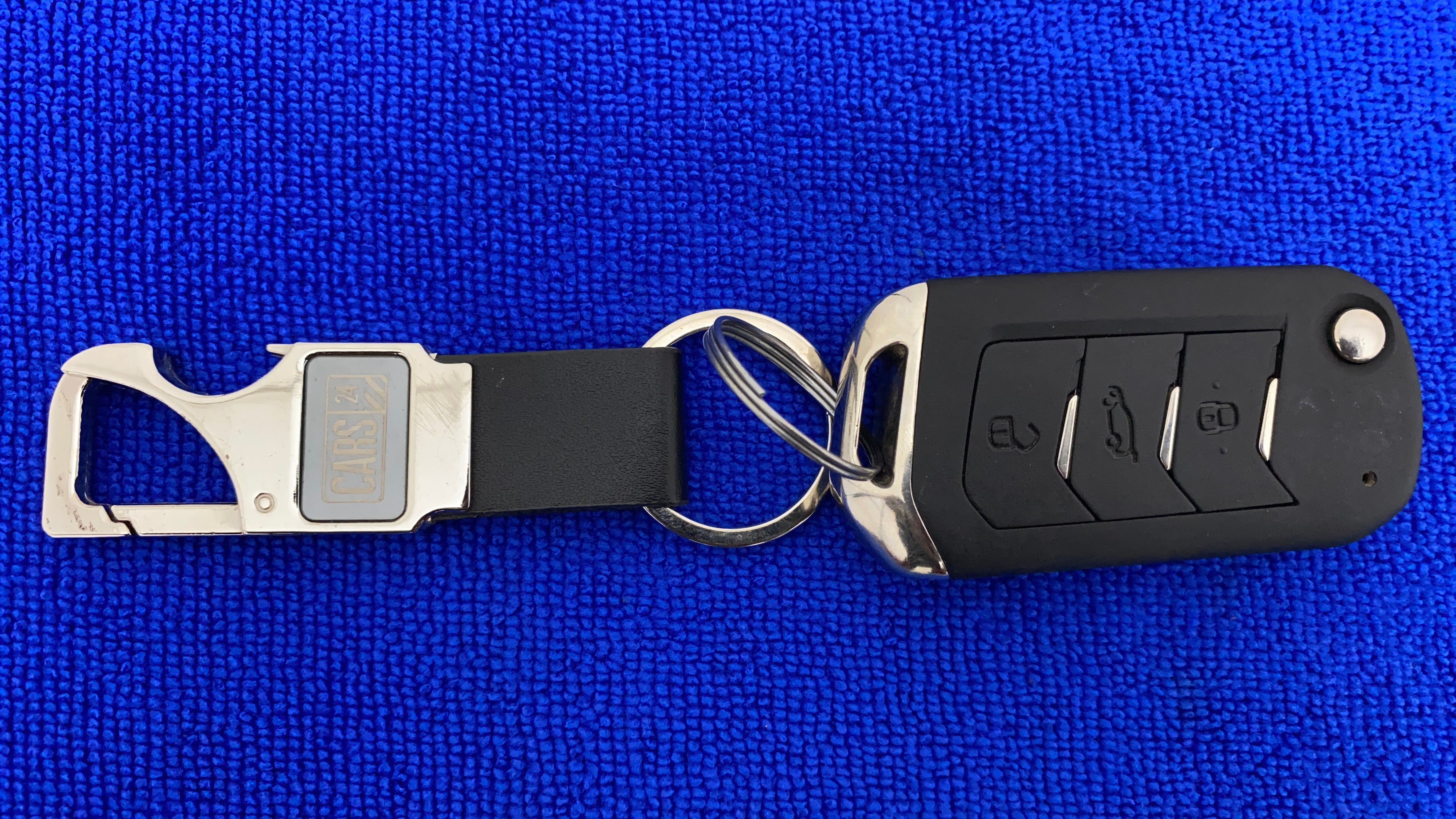 Car key fob on a keychain for a Mahindra XUV700
