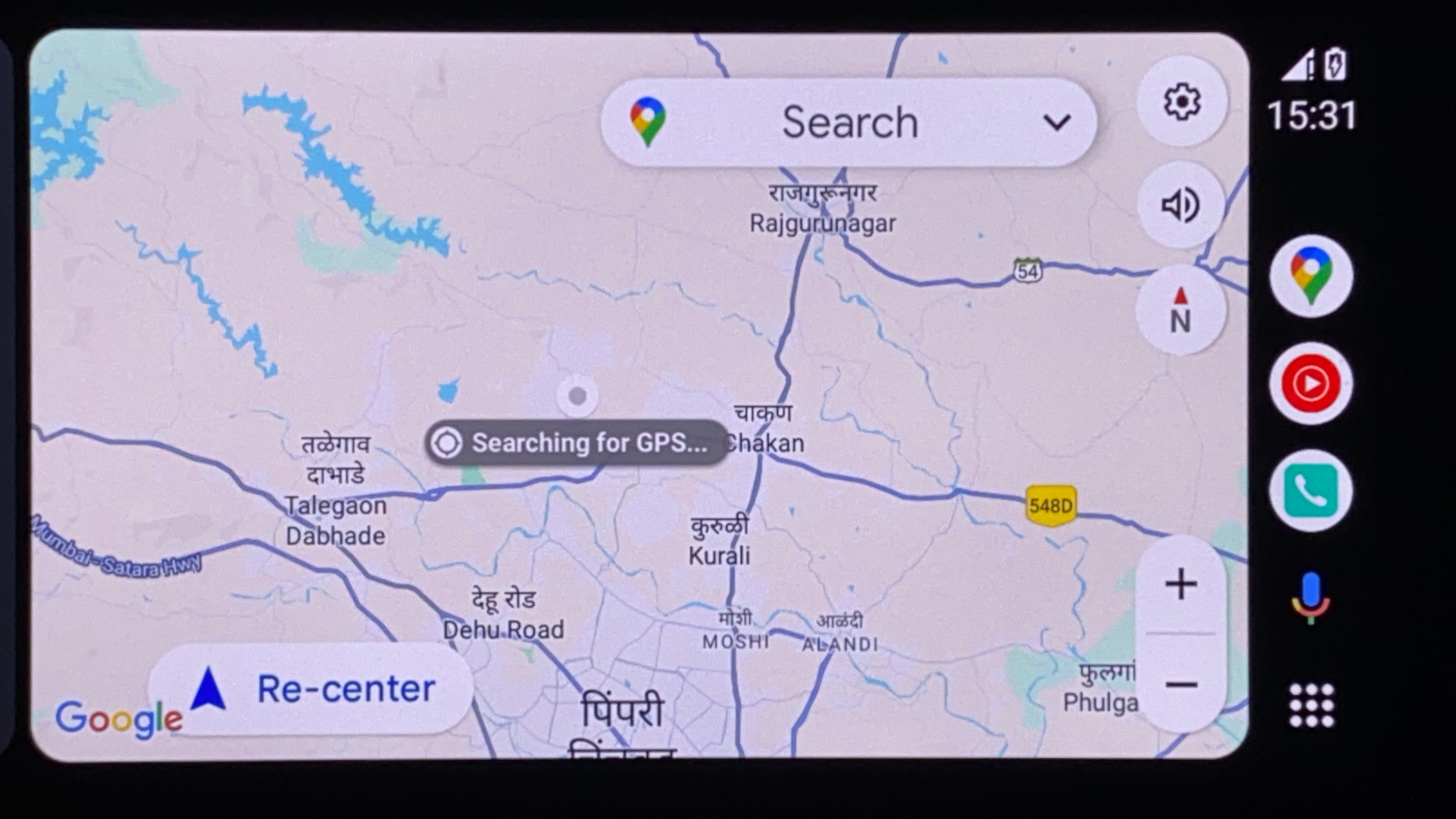 Infotainment screen showing Google Maps navigation interface of a Mahindra XUV700