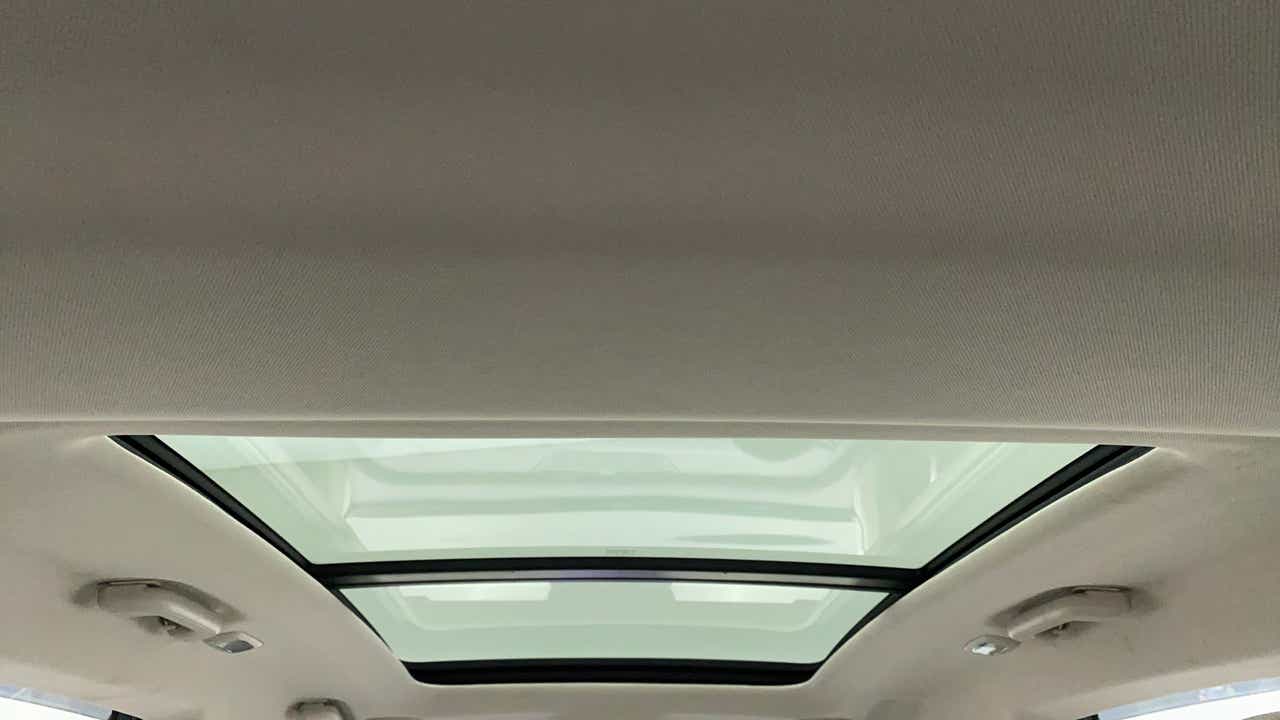 Panoramic sunroof view of a Mahindra XUV700