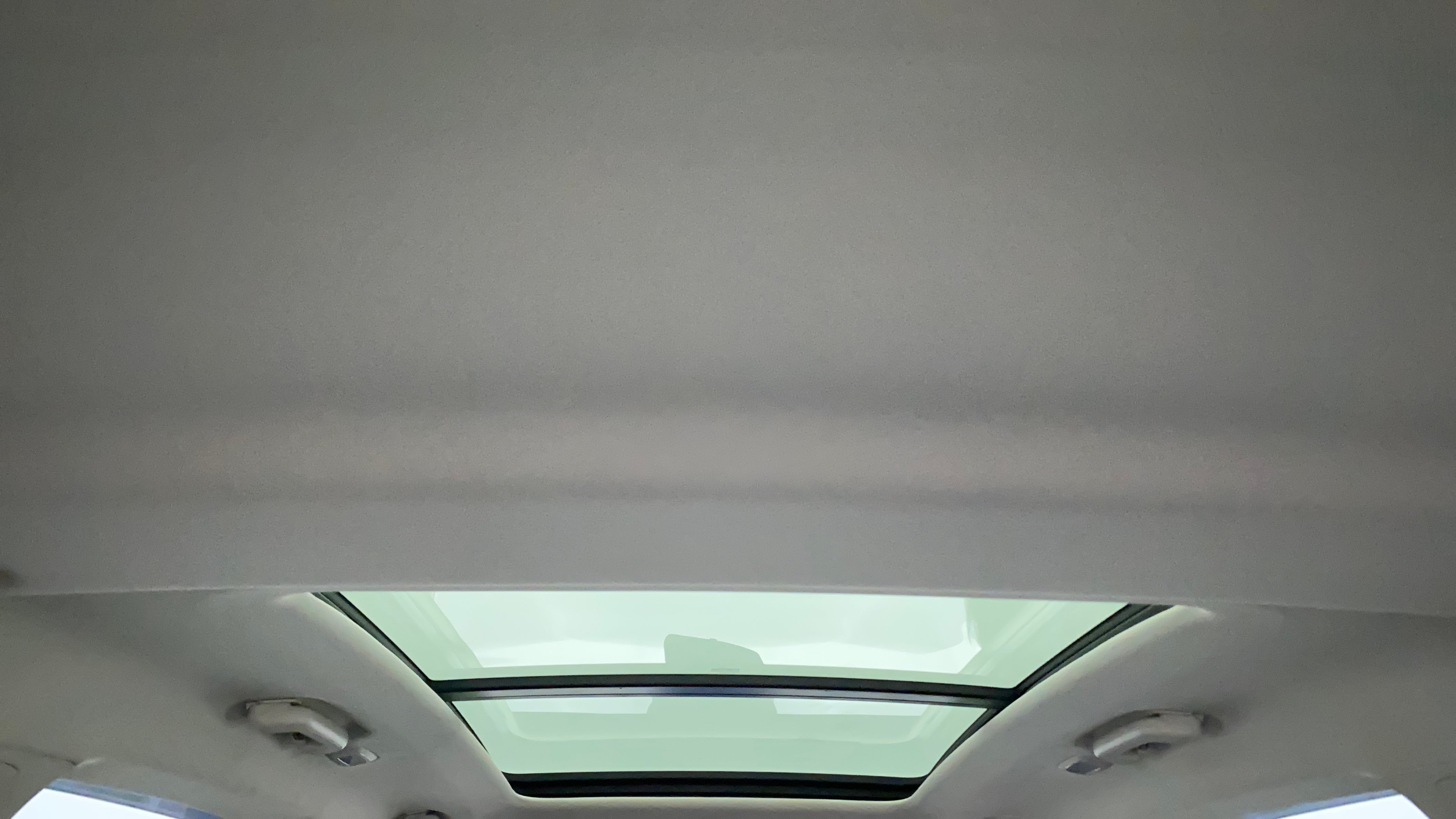 Panoramic sunroof interior view of a Mahindra XUV700