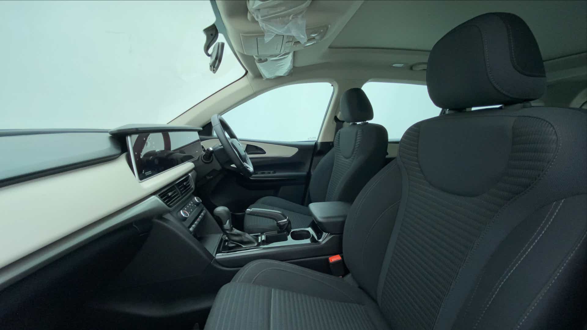 Interior front seats and dashboard of a Mahindra XUV700