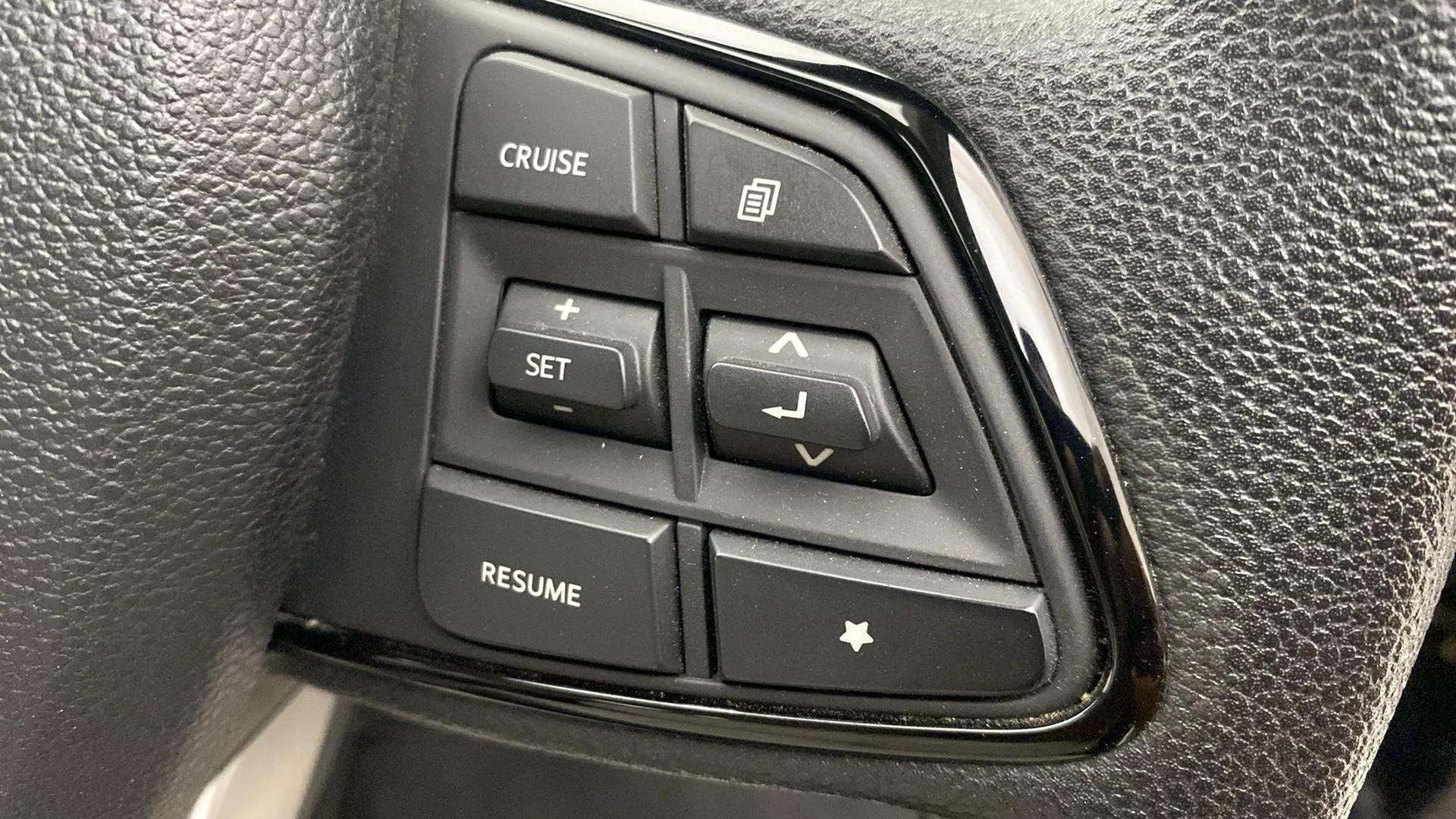 Steering wheel controls of a Mahindra XUV700