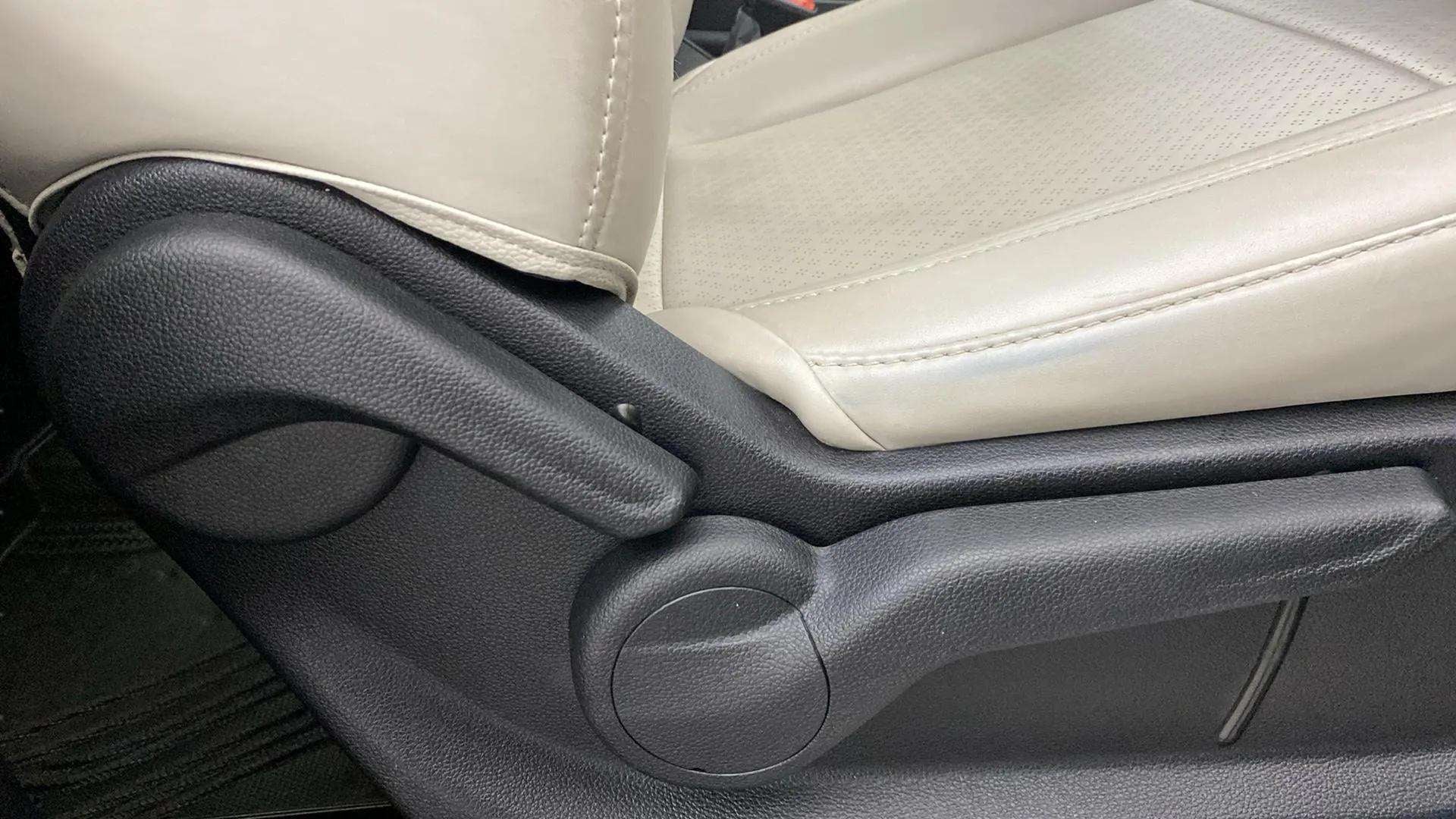 Side view of front seat adjuster of a Mahindra XUV700