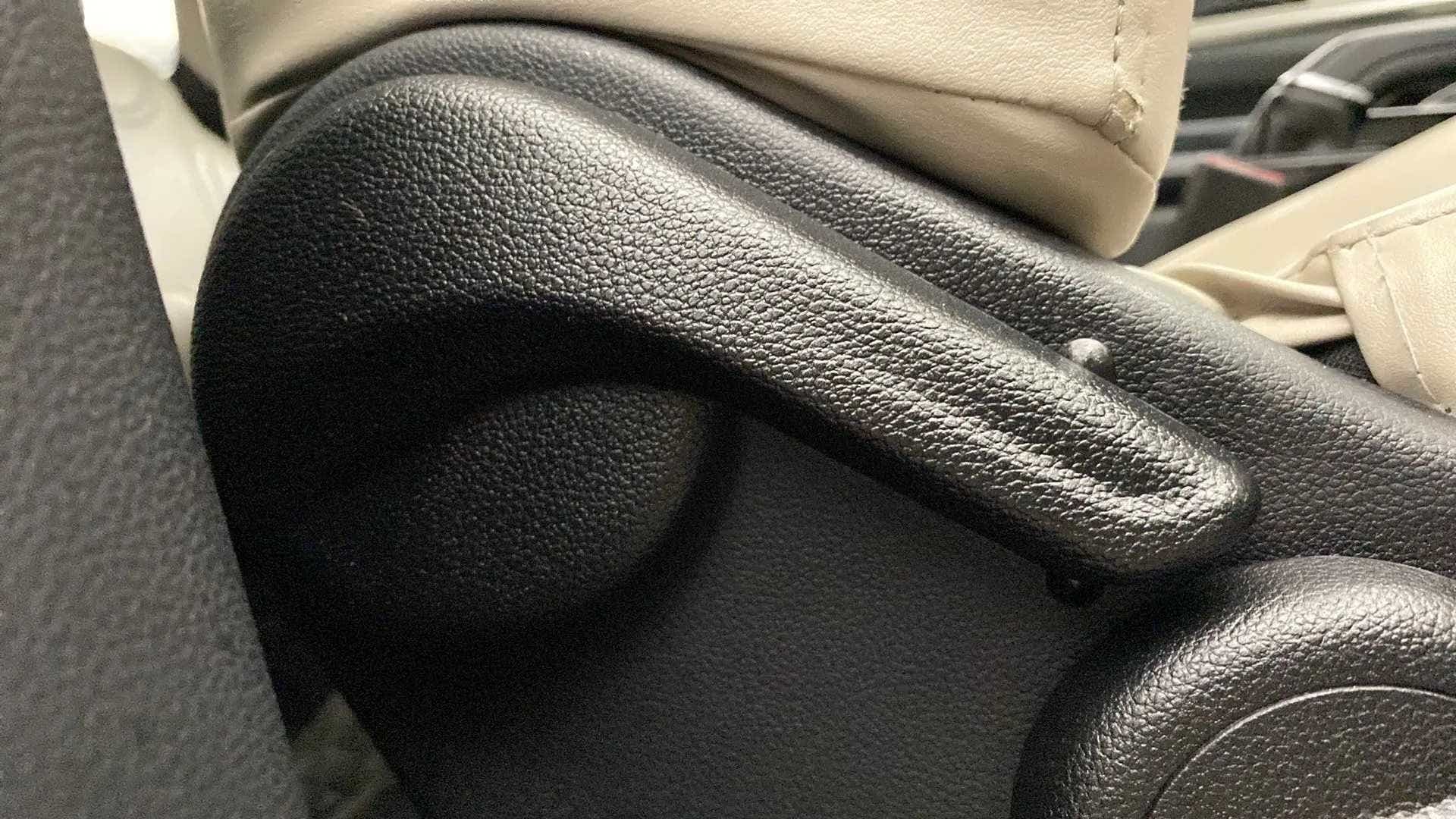 Close-up of the seat adjustment lever in a Mahindra XUV700