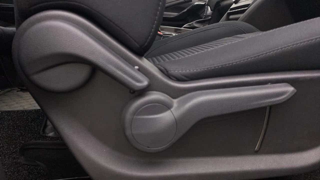 Side adjustment lever of a Mahindra XUV700 car seat
