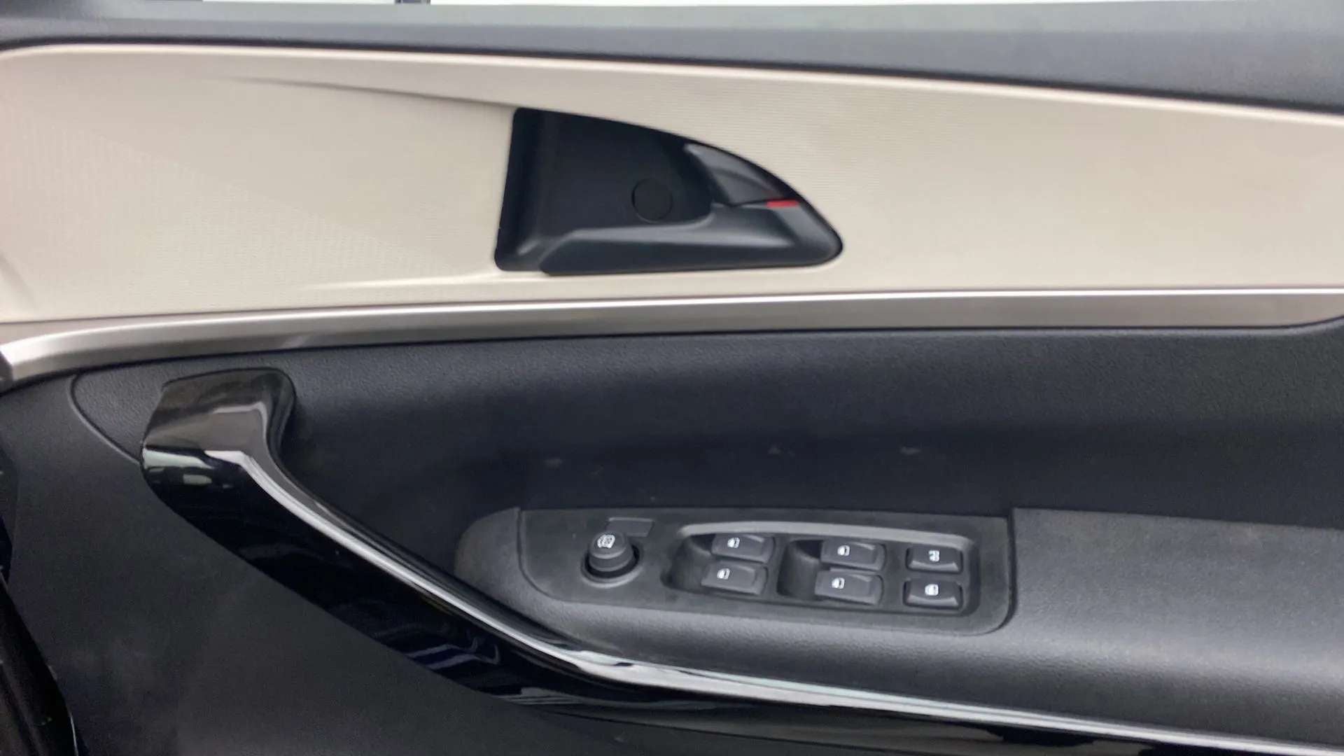 Driver side door controls of a Mahindra XUV700