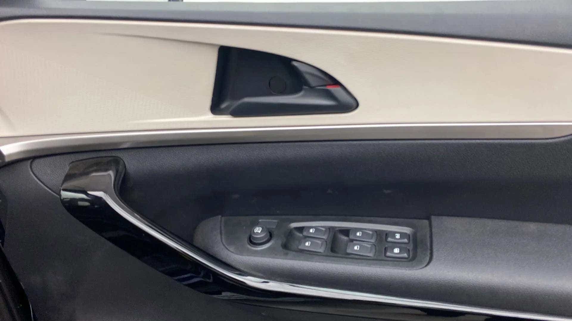 Driver side door controls of a Mahindra XUV700