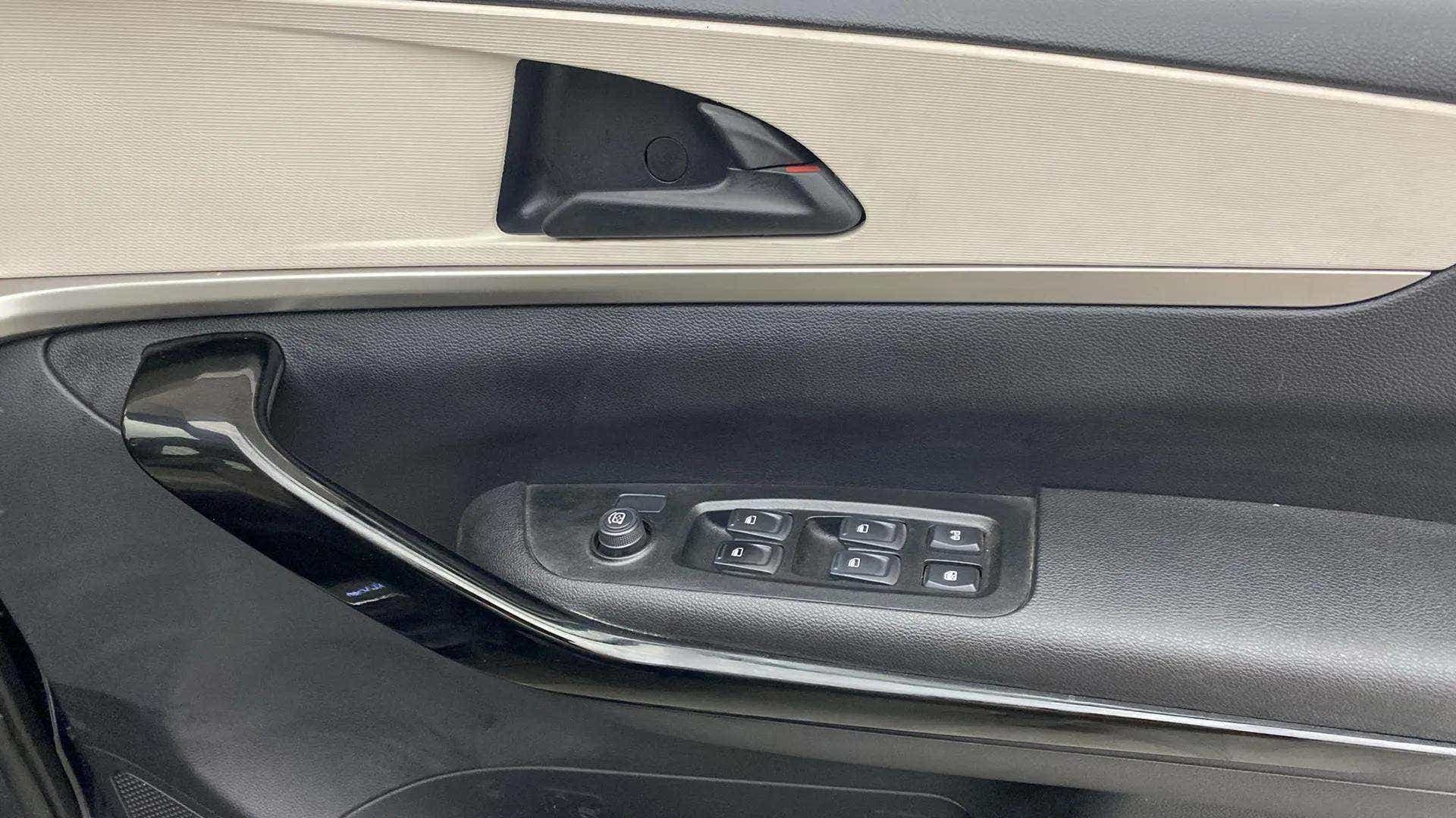 Front door interior controls of a Mahindra XUV700