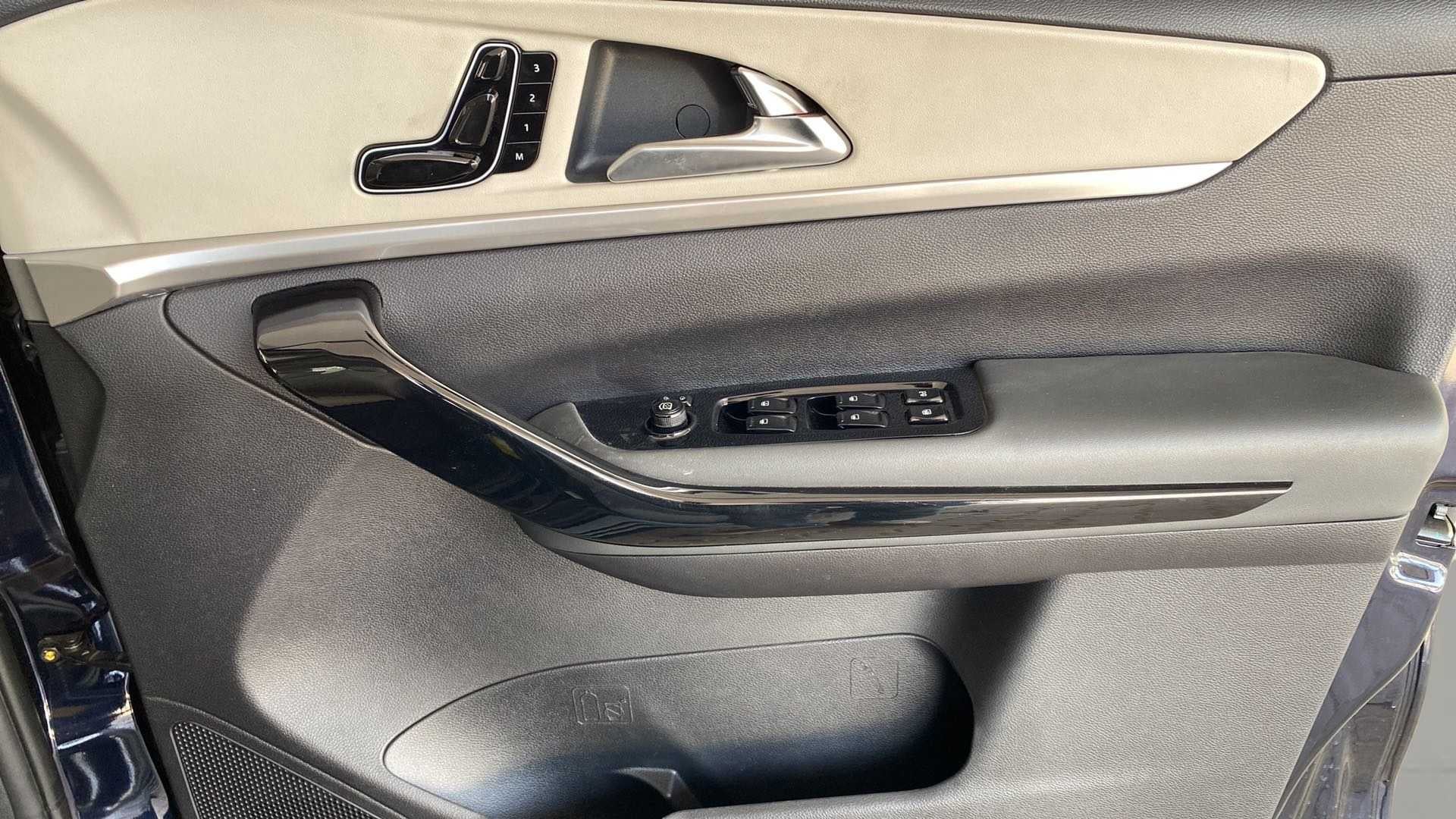 Interior driver door panel of a Mahindra XUV700