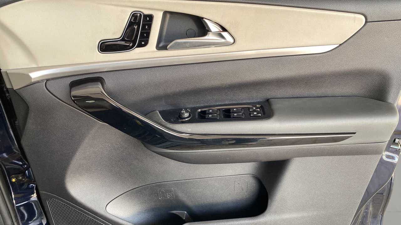 Interior driver door panel of a Mahindra XUV700