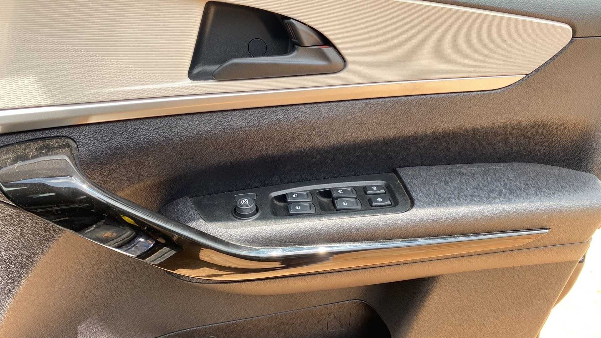 Driver door controls of a Mahindra XUV700