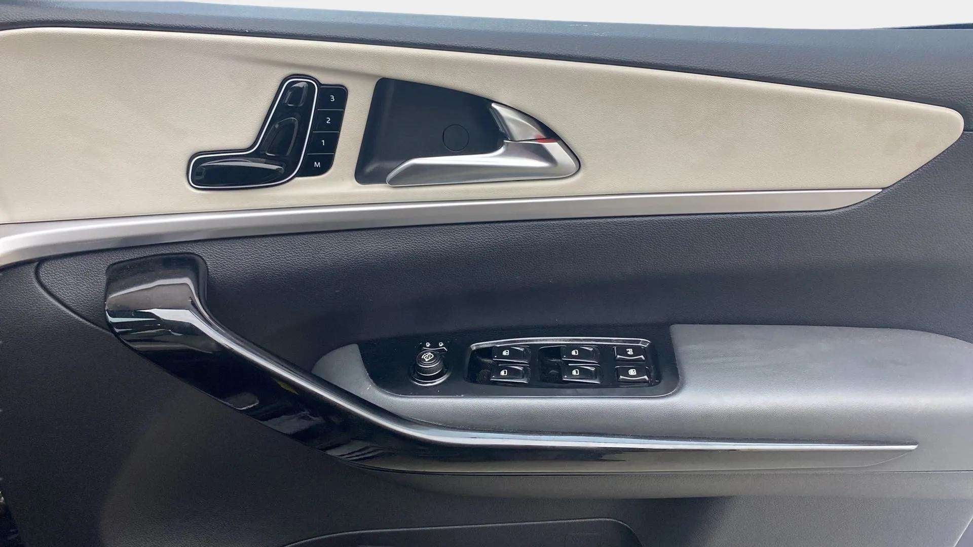 Front door panel controls of a Mahindra XUV700