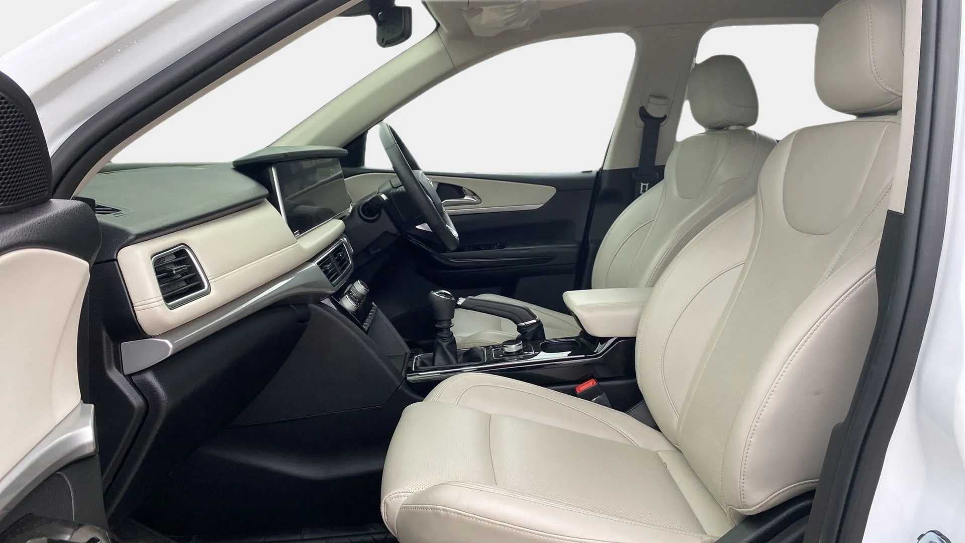 Front interior seats and dashboard of a Mahindra XUV700
