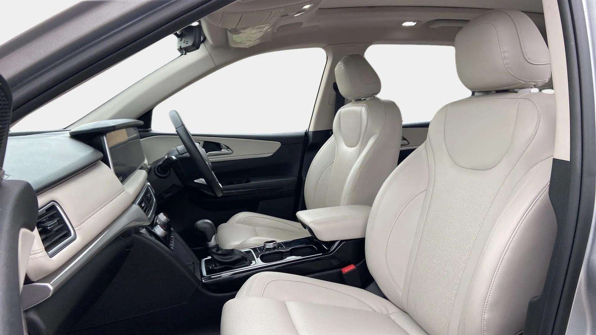 Front interior seats and dashboard of a Mahindra XUV700