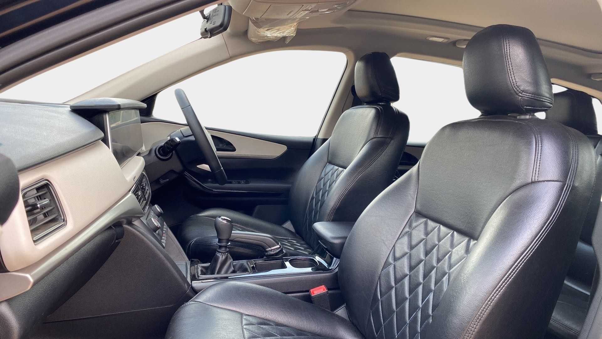 Front interior seats and dashboard of a Mahindra XUV700