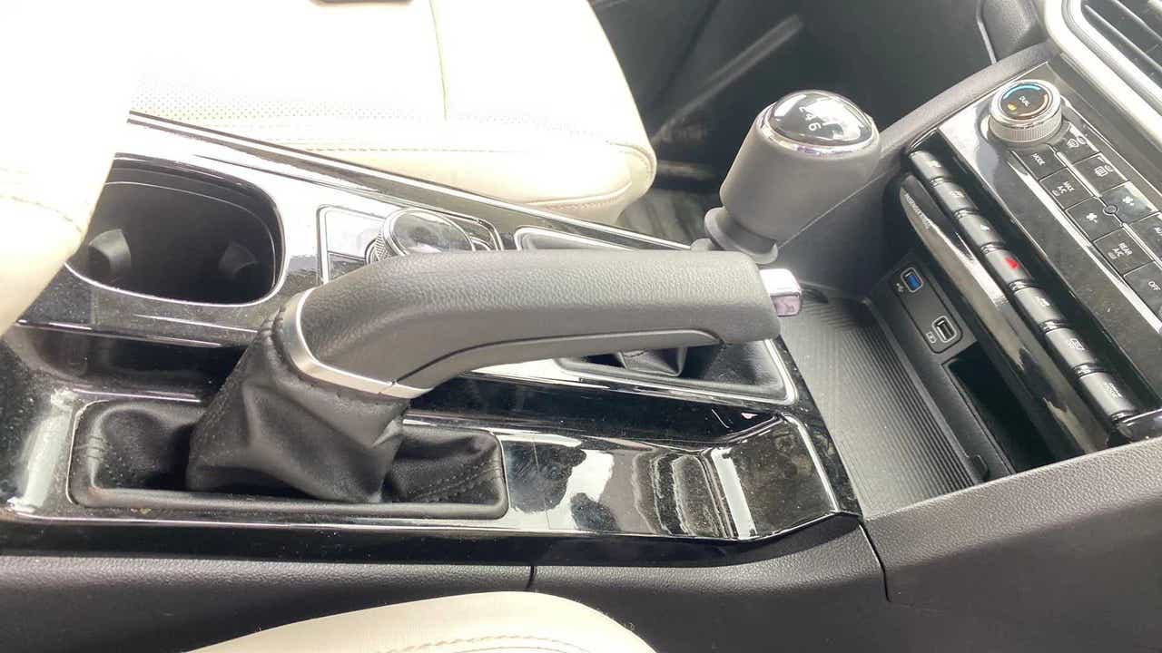 Center console and handbrake of a Mahindra XUV700