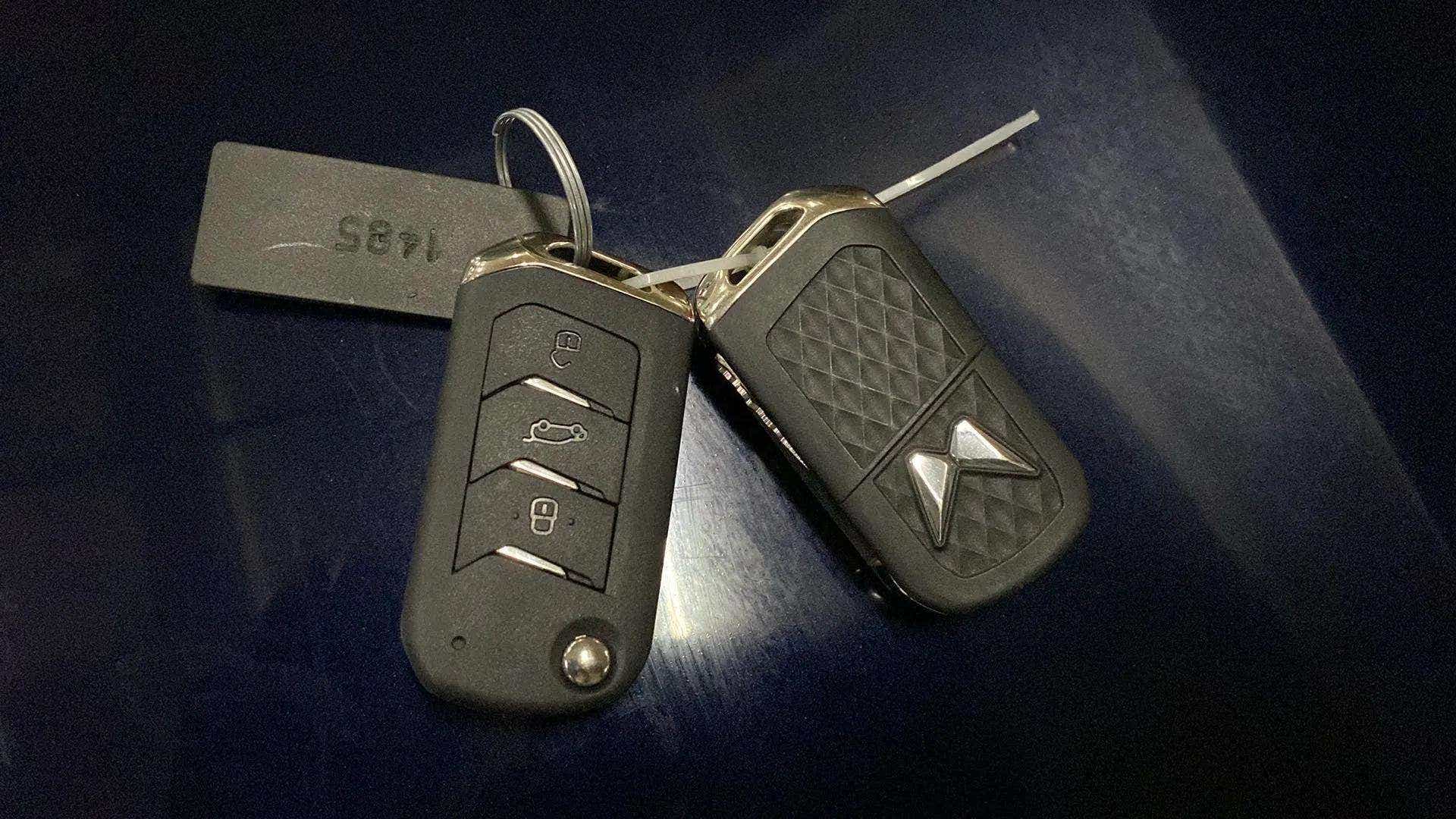 Close-up of a key fob for a Mahindra XUV700