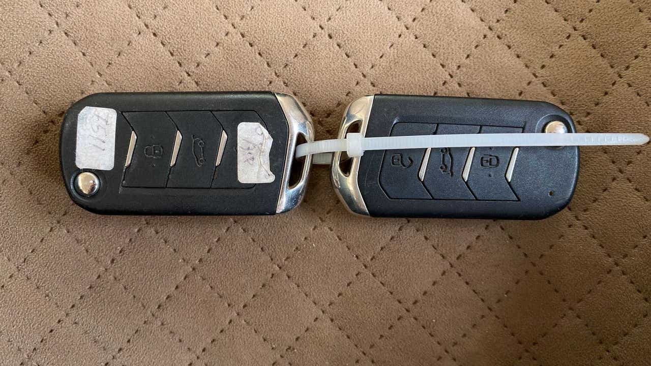 Close-up of a Mahindra XUV700 key fob set