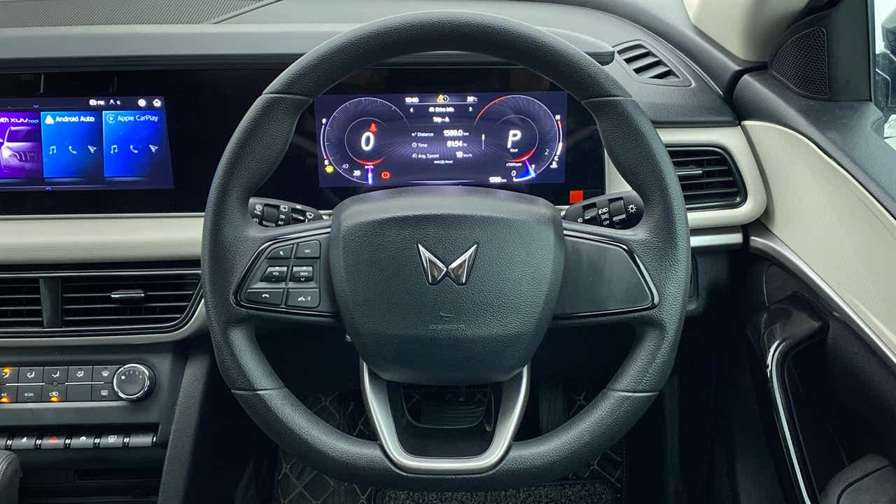 Interior dashboard and steering wheel of a Mahindra XUV700