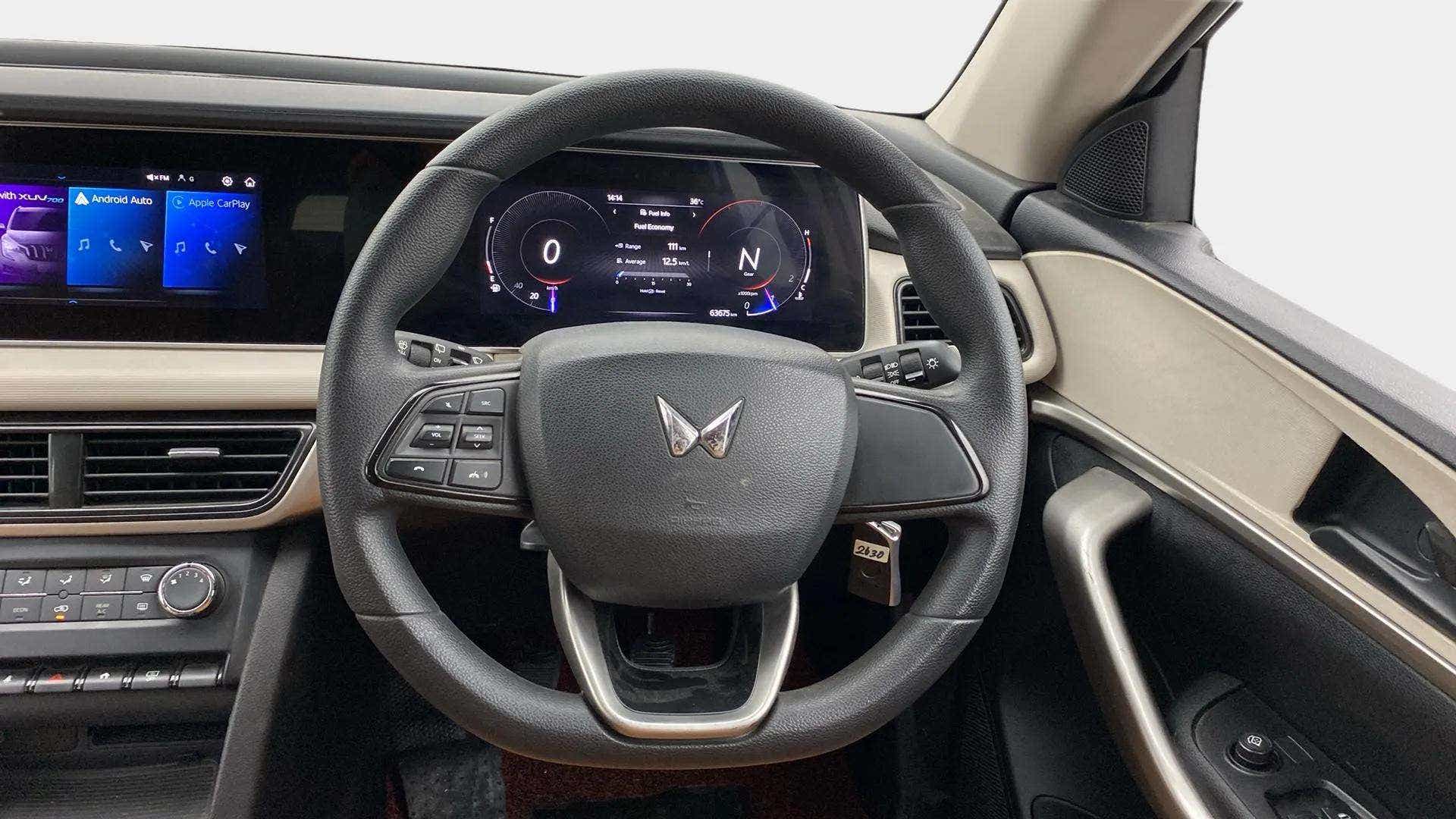 Interior dashboard and steering wheel of a Mahindra XUV700