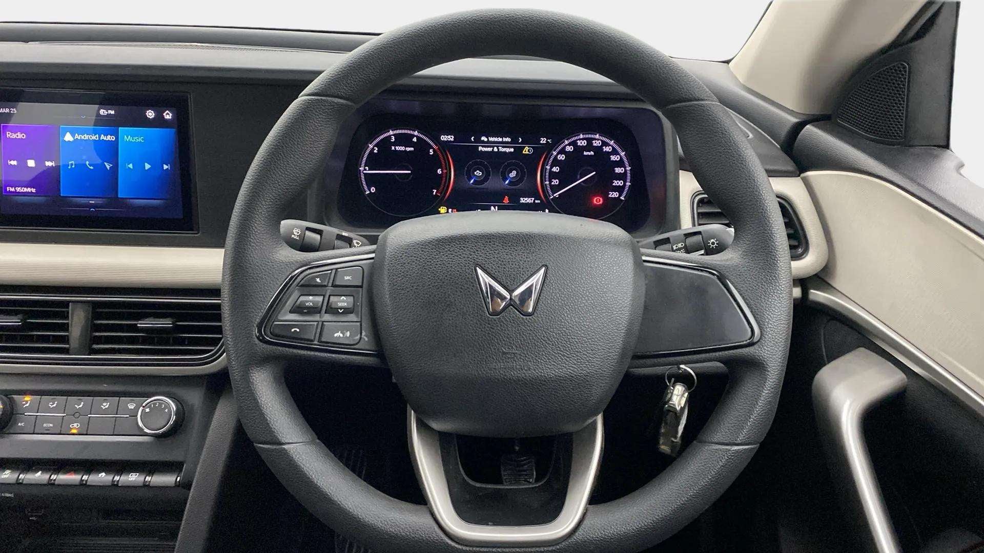 Steering wheel and dashboard of a Mahindra XUV700