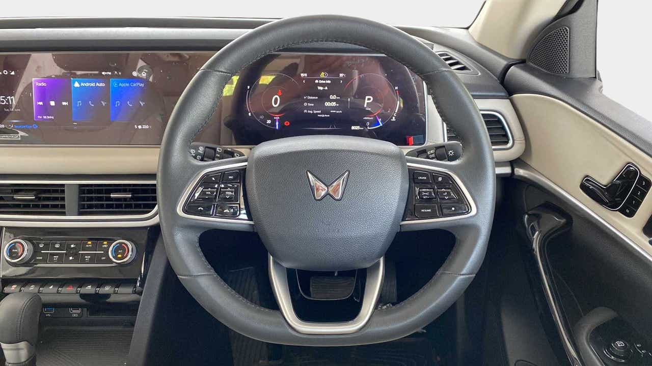 Interior dashboard and steering wheel of a Mahindra XUV700