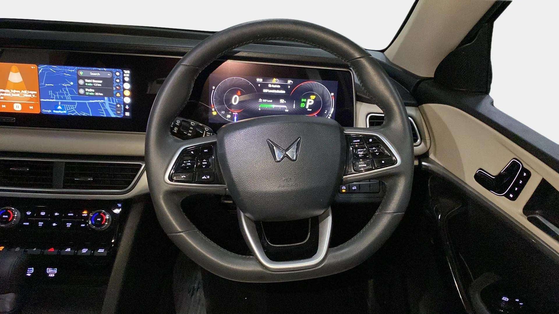 Interior dashboard and steering wheel of a Mahindra XUV700
