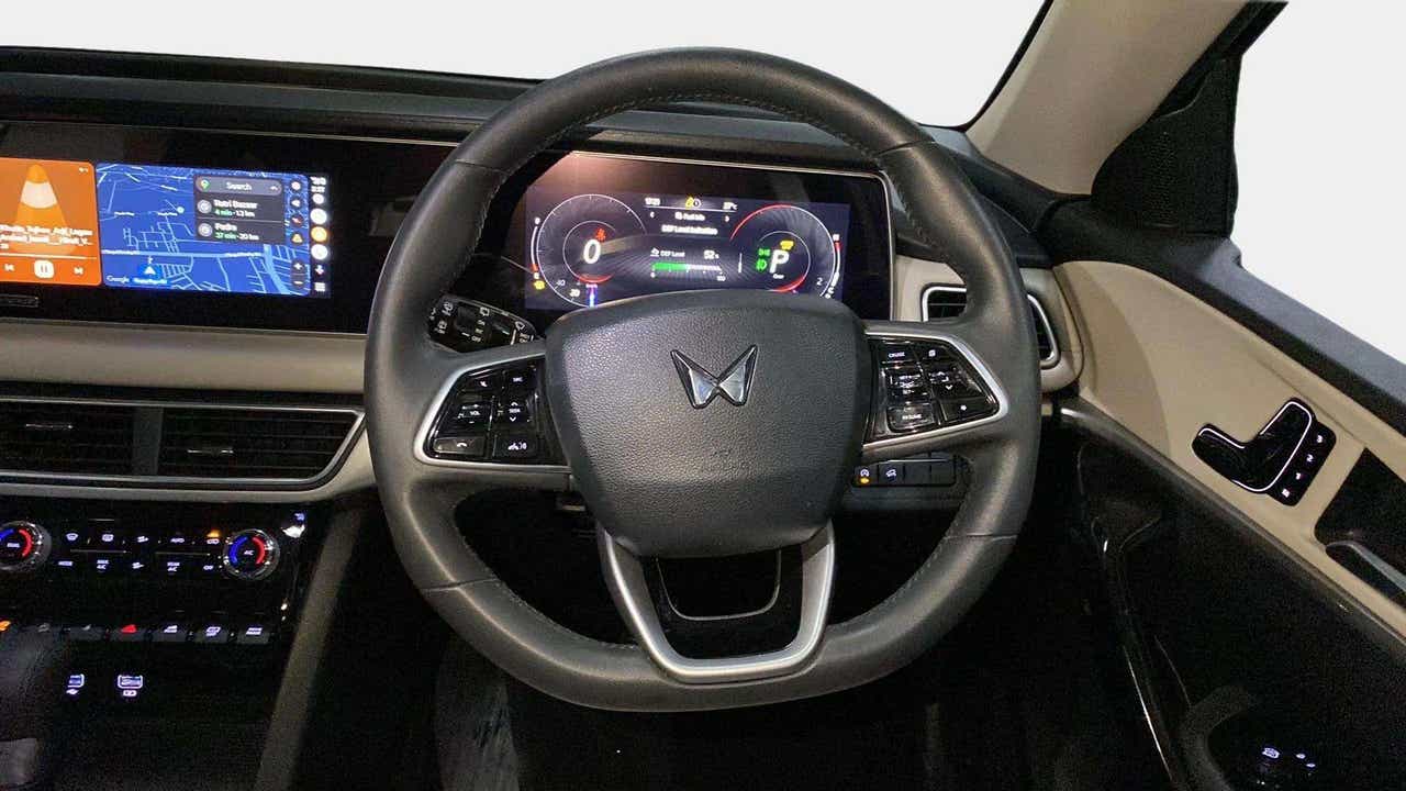 Interior dashboard and steering wheel of a Mahindra XUV700