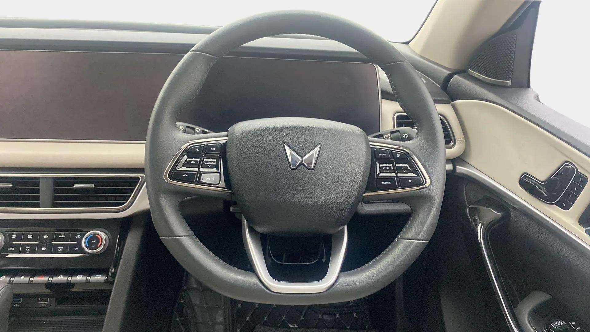 Steering wheel and dashboard of a Mahindra XUV700