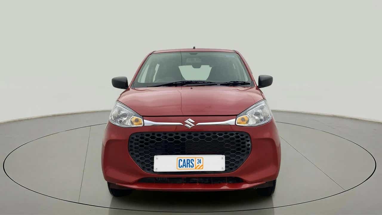 Front view of a Metallic Sizzling Red Maruti Suzuki Alto K10