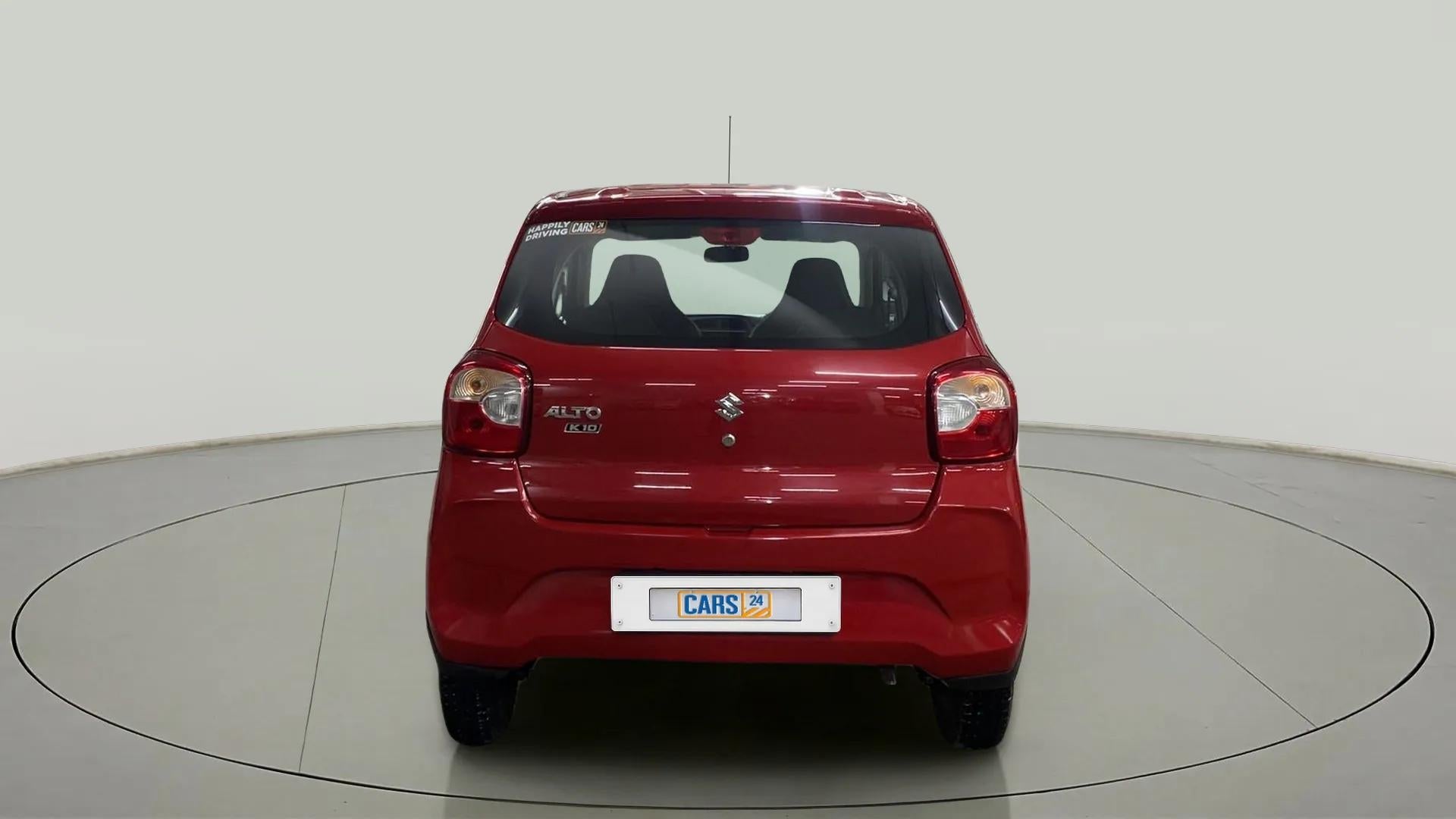 Rear view of a metallic-sizzling-red Maruti Suzuki Alto K10