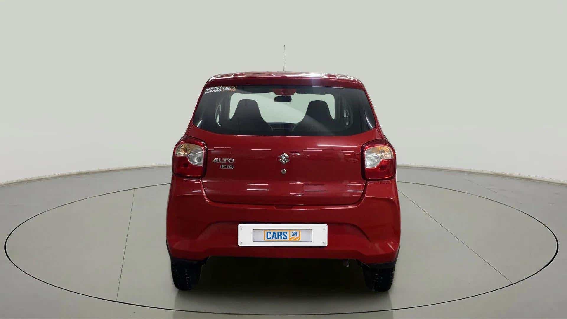 Rear view of a metallic-sizzling-red Maruti Suzuki Alto K10