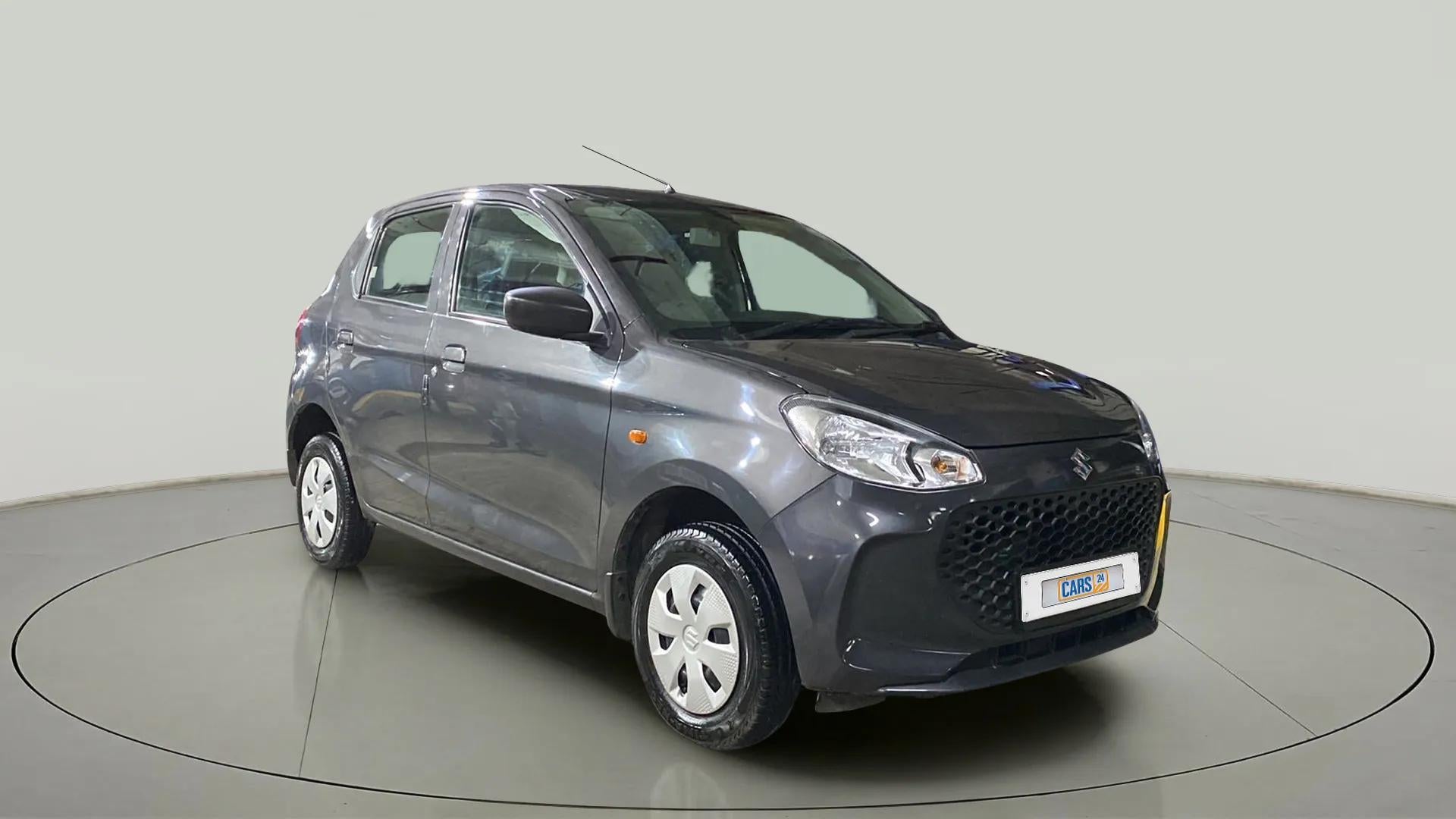 Front three-quarter view of a Granite Grey Maruti Suzuki Alto K10
