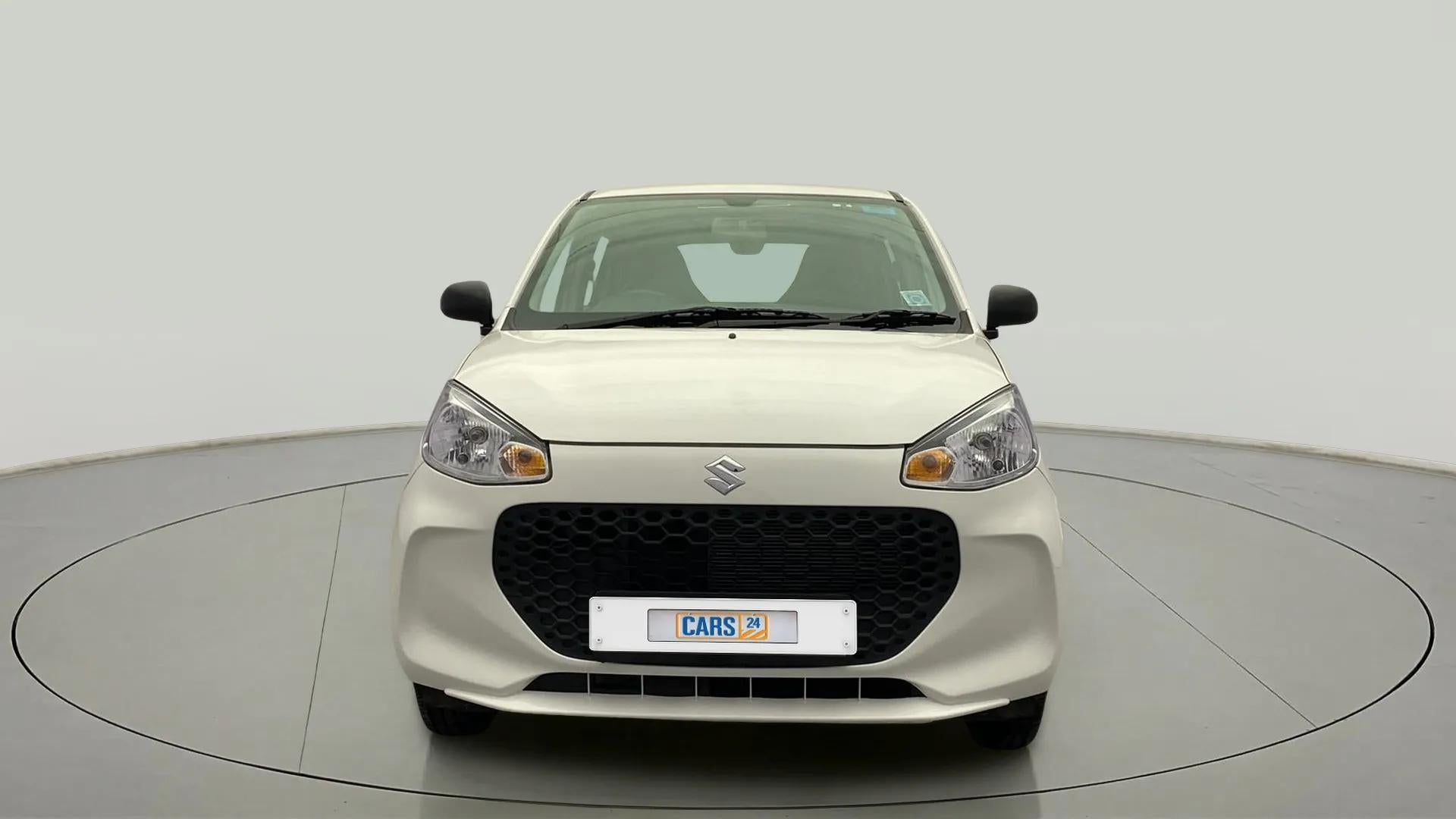 Front view of a Metallic Solid White Maruti Suzuki Alto K10
