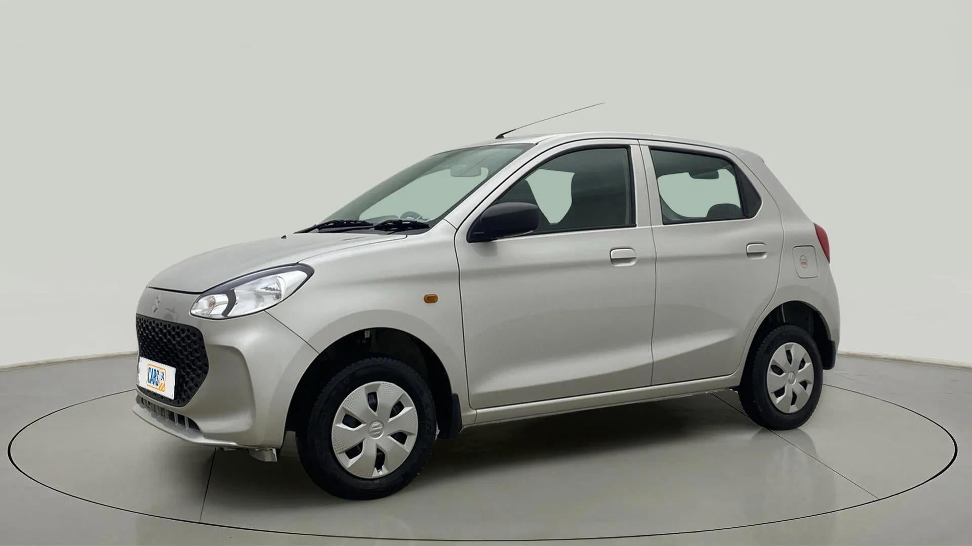 Front side view of a metallic silky silver Maruti Suzuki Alto K10
