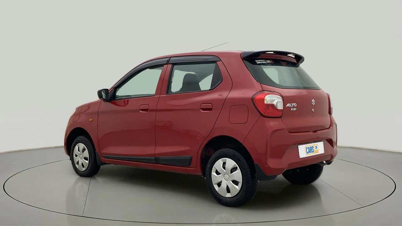 Rear three-quarter view of a Metallic Sizzling Red Maruti Suzuki Alto K10