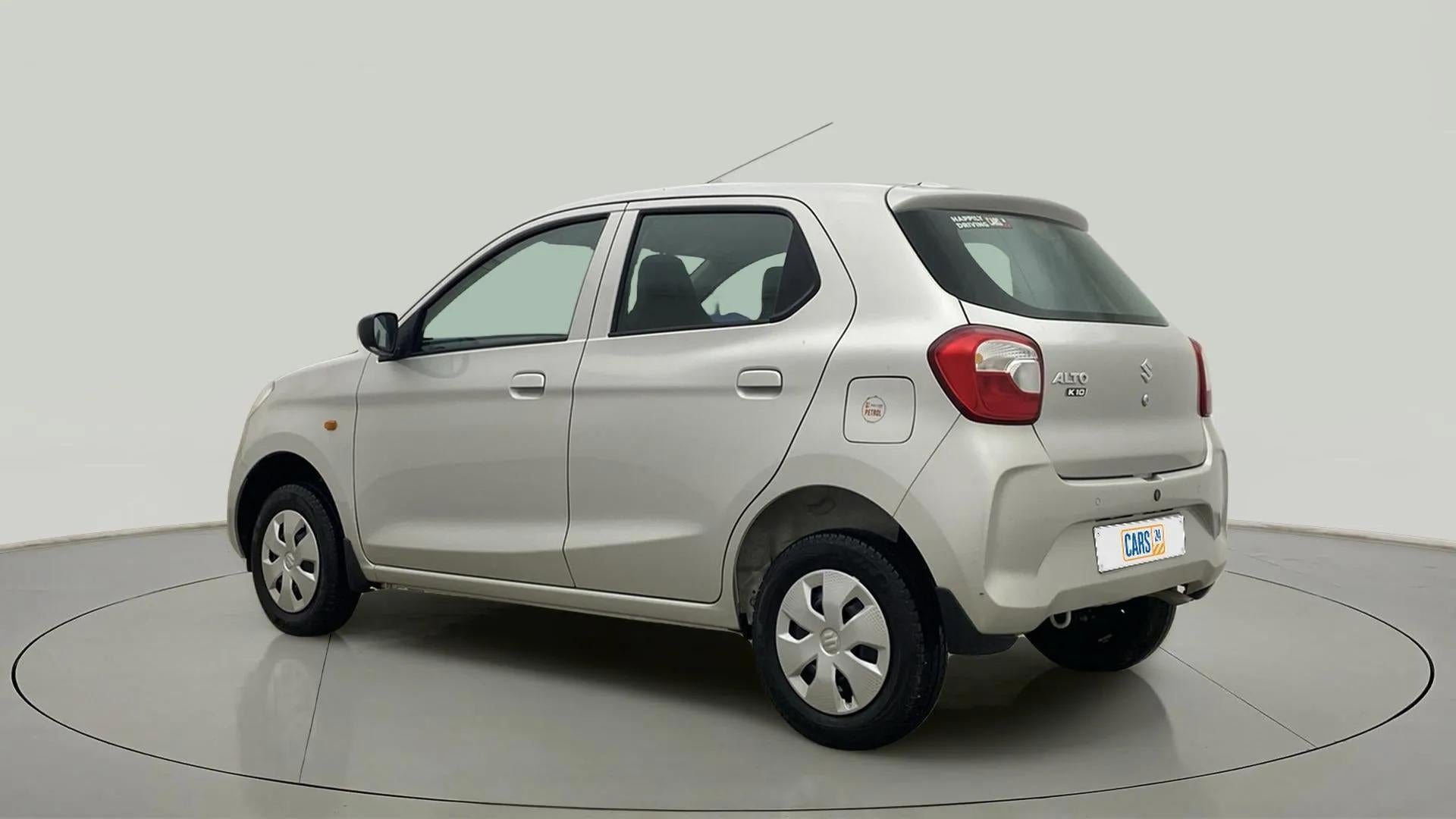 Rear three-quarter of a metallic silky silver Maruti Suzuki Alto K10