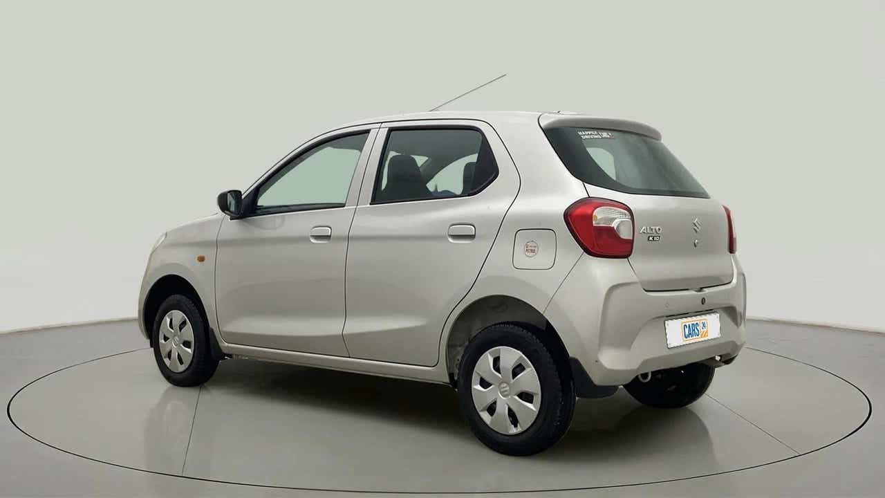 Rear three-quarter of a metallic silky silver Maruti Suzuki Alto K10