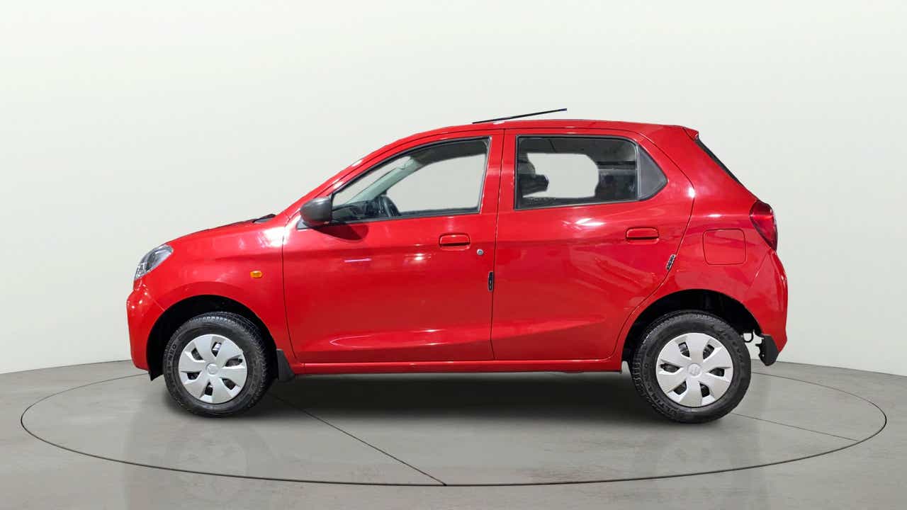 Side view of a Metallic Sizzling Red Maruti Suzuki Alto K10